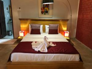 Postelja oz. postelje v sobi nastanitve Hotel Heladiv