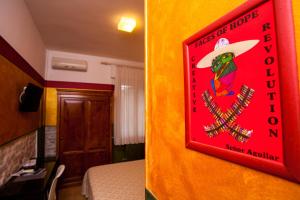 TV a/nebo společenská místnost v ubytování Hotel Diana