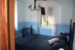 Postel nebo postele na pokoji v ubytování Fontana's House Relax