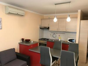 Kuchyň nebo kuchyňský kout v ubytování Apartment Vita Moela 23 & 24