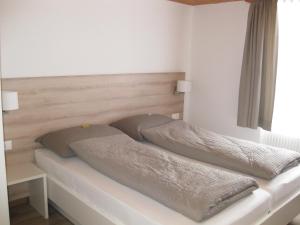Voodi või voodid majutusasutuse Hotel Hubertus toas