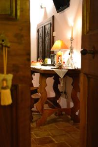 Kuchyň nebo kuchyňský kout v ubytování B&B Palazzo La Loggia
