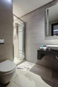 Koupelna v ubytování Khuttar Apartment + 37 fotografií