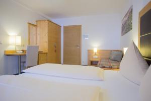 Letto o letti in una camera di Hotel Ennskraxblick
