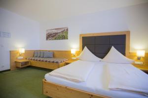Letto o letti in una camera di Hotel Ennskraxblick