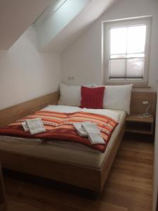 Łóżko lub łóżka w pokoju w obiekcie Ferienhaus Wind