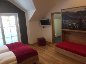 Telewizja i/lub zestaw kina domowego w obiekcie Ferienhaus Wind