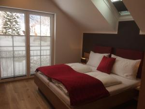 Łóżko lub łóżka w pokoju w obiekcie Ferienhaus Wind