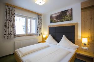Letto o letti in una camera di Hotel Ennskraxblick