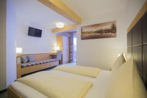 Letto o letti in una camera di Hotel Ennskraxblick