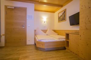 Letto o letti in una camera di Hotel Ennskraxblick