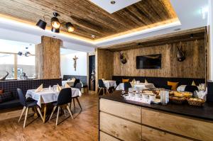 Nápoje v ubytovaní Hotel Garni Persutt