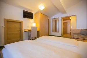 Letto o letti in una camera di Hotel Ennskraxblick