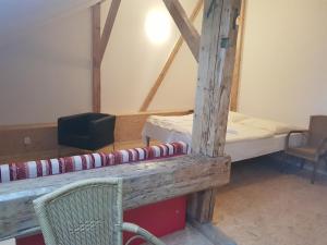 Postel nebo postele na pokoji v ubytování Městský Hotel Dorinka