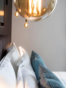Postel nebo postele na pokoji v ubytování Hôtel-Restaurant Bel Ami