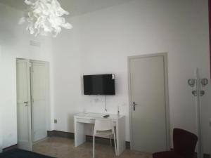 TV a/nebo společenská místnost v ubytování B&B la cascata