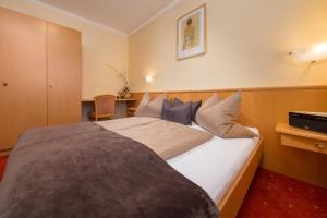 Letto o letti in una camera di Rainer's Appartements