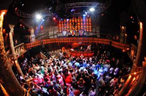 a large crowd of people standing around a stage at Margarita Napa Apartments in Ayia Napa