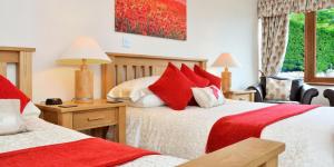 Postel nebo postele na pokoji v ubytování Peggyslea Farm B&B