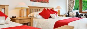 Postel nebo postele na pokoji v ubytování Peggyslea Farm B&B