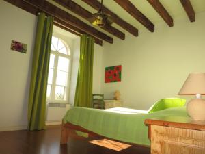 Postel nebo postele na pokoji v ubytování Chambres d'hôtes du Moulin de la Chaussee