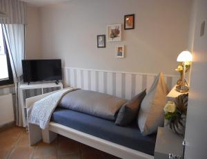 TV a/nebo společenská místnost v ubytování Privatzimmer Spahn in Mühlheim