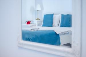 Ένα ή περισσότερα κρεβάτια σε δωμάτιο στο City Lux Villa