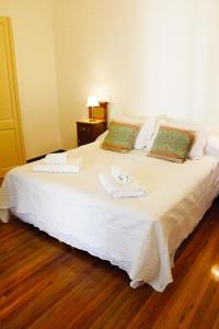 מיטה או מיטות בחדר ב-Divina Casona Posada Boutique