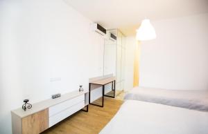 Katil atau katil-katil dalam bilik di Meidan Suites