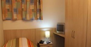 A television and/or entertainment centre at Euro Hotel