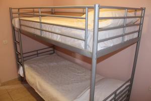 a couple of bunk beds in a room at Prosilia Guesthouse in Prosília
