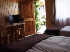 Hotel Último Paraíso客房内的一张或多张床位