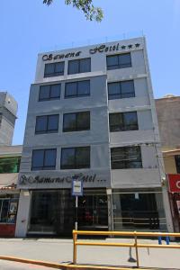 a building with a sign on the side of it at Samana Hotel in Arequipa