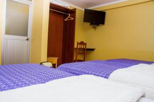 Postel nebo postele na pokoji v ubytování Rayos Del Sol