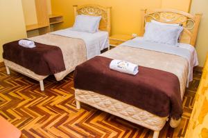 Een bed of bedden in een kamer bij Rayos Del Sol