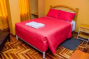 Een bed of bedden in een kamer bij Rayos Del Sol