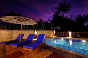 Bazén v ubytování Sari Villa Ubud nebo v jeho okolí