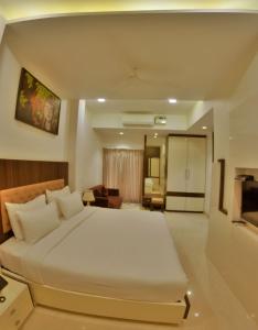 Кровать или кровати в номере Hotel Rezo's