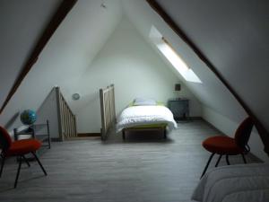 מיטה או מיטות בחדר ב-Le Côte d'Albâtre