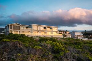 a house on top of a hill at Schulphoek Seafront House in Hermanus