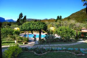 A piscina localizada em Pousada Villa Lagoa das Cores ou nos arredores