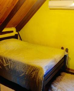 Llit o llits en una habitació de Casa de Campo,Sítio,Vale Europeu-SC