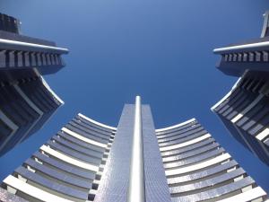 two tall buildings are looking up into the sky at Apartamento Em Fortaleza De Frente Para O Mar in Fortaleza