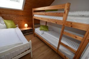 Postel nebo postele na pokoji v ubytování Haus Verdi