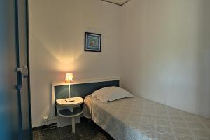 Postel nebo postele na pokoji v ubytování Hotel la Parata