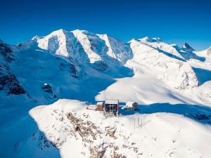an aerial view of a snow covered mountain at Berghaus Diavolezza in Berninahäuser