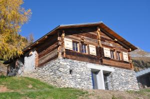 a house on the side of a hill at Le Mayen de Colombire in Crans-Montana