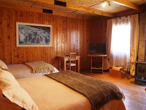 Hotel Último Paraíso客房内的一张或多张床位
