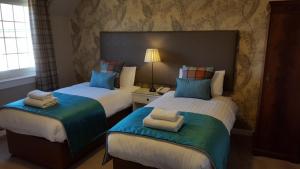 Cama o camas de una habitación en Bridge of Orchy Hotel