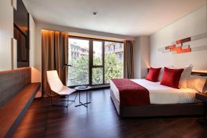 Postel nebo postele na pokoji v ubytování Olivia Balmes Hotel